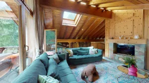 Image of This exclusive duplex apartment right at the slope next to the forest offers app