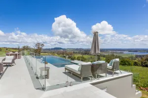 Image of Expansive Hamptons home on acreage, with pool, spa, gym, tennis court & views.