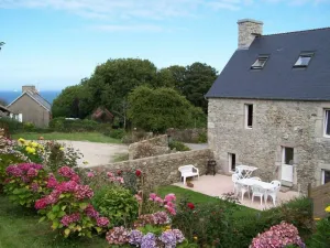 Image of Charming Stone House in La Hague - 3 BR, Modern Comfort, Enclosed Garden, Near Coastal Scenery