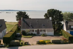 Image of Family home with the ocean at the end of the garden.