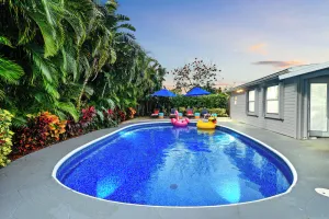 Image of 4 BR |  SLEEP 10 | PRIVATE GUEST SUITE | HEATED POOL |  NEAR BEACHES, WATERPARK & PGA