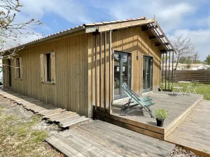 Image of Small wooden house on the edge of a forest