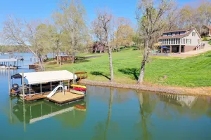 Image of Pristine lake house offering watersports, gameroom favorites, and stunning view