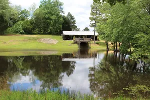 Image of Cozy Cabin in Hamilton w\/private pond. Fish, paddle, hike or relax in the tub!