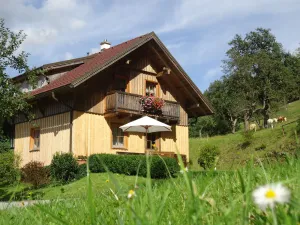 Image of countryside, mountains, garden, balcony, parking lot