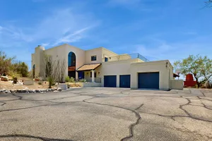 Image of Dazzling retreat with city views, pool, hot tub, bocce ball court, & roof deck