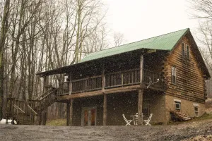 Image of Cozy 4 Bedroom Log Cabin Getaway near Snowshoe, West Virginia With Hot Tub