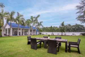 Image of Timeless Elegance by StayVista - Poolside Villa with Lawn & Terrace