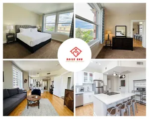 Image of Downtown Digs-View of the City! Stay above local restaurants and nightlife, posh amenities heated toilet seat, oversized rain shower head in glass shower, in-unit laundry, one garage parking spot