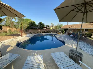 Image of 5 bedroom, 4 bath house, game room, yard and private fenced pool