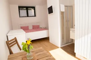 Image of New apartment in an oasis of wellbeing with a private courtyard and sun terrace.