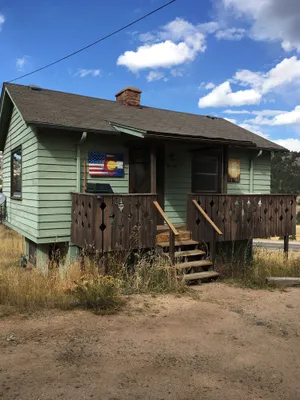 Image of Stay in this charming vintage cabin with a wood burning fireplace,