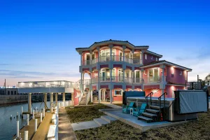Image of Bayfront home with dock, private elevator, central AC & grill -snowbird-friendly