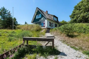 Image of Beautiful dune villa with thatched roof on Ameland