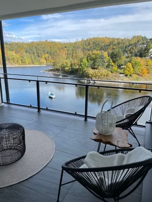 Image of Apartments- Saaldorf WG 6 with balcony and view of the reservoir
