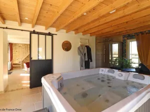 Image of Romantic Hideaway with Spa, Massage Table, and Champagne in Norman Countryside