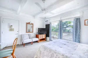 Image of Tropical studio w\/ grill area, shared hot tub, outdoor pool & near the beach
