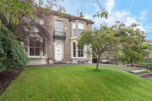 Image of A luxurious Victorian mansion garden apartment