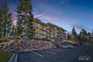 Image of Lake View with ski lifts at the parking lot. Upper unit with good views.