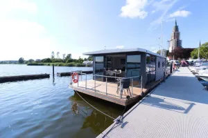 Image of Houseboat Fjord Aries with roof terrace in Schleswig