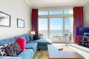 Image of Gorgeous beachfront penthouse getaway with shared pool and private balcony