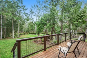 Image of Gorgeous Wooded Retreat w\/ Fireplace, Firepit, Deck, Yard, W\/D and private loft