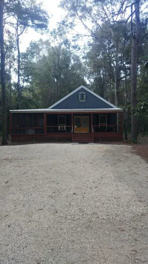 Image of Luxury cabin retreat in the woods.