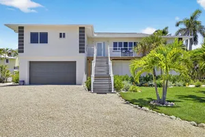 Image of NEW!!  light and airy coastal ground level canal front home!