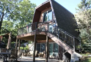 Image of Picturesque lake home w\/ separate entertainment lodge