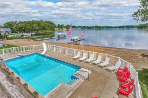 Image of Lakefront W\/ Private Beach, Pool, Hot Tub, Golf Simulator, Projector, Bar & more