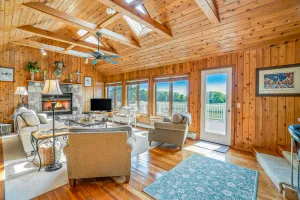 Image of Family-friendly home with expansive deck, large lawn