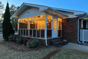 Image of Comfortable home near beach with enclosed porch, washer\/dryer, & central AC