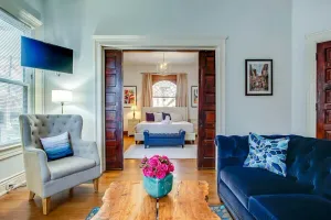 Image of King Bed, walk to restaurants, shops, and nightlife. Private Fenced Backyard