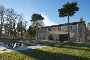 Image of Beautiful house between vineyards and orchards