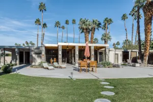 Image of Luxurious home w\/ expansive patio, shared pool, gas fireplace, mountain views