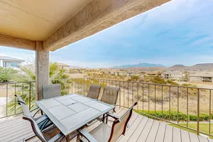 Image of Mountain-view look out to Snow Canyon, with pools, hot tub and sports courts
