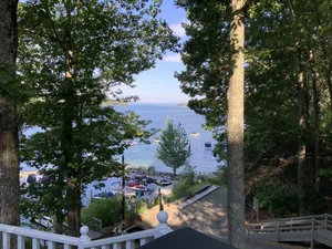 Image of Family Friendly house with lakefront views surrounded by trees