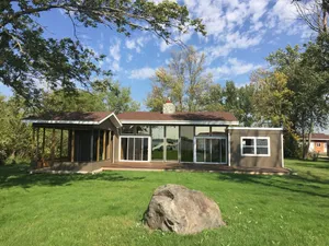 Image of Cozy Lake House with water on 3 sides! Walking distance to the Golf Course!