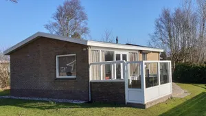 Image of Ground floor House with terrace on south. Near woods and outdoor swimming pool.