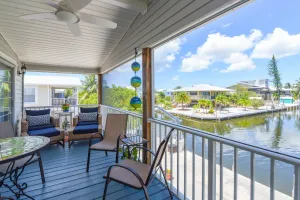 Image of Key Blessing: Experience the Keys Life at This Charming 3BR Canal Front Home, Dockage & Dog-Friendly