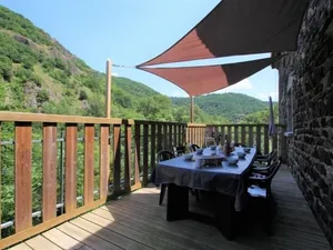 Image of Riverfront Retreat with Spacious Rooms & Terrace - Ideal for Families and Adventurers