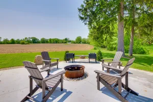 Image of Spacious Massillon Log Cabin w\/ Fire Pit!