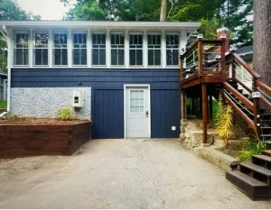 Image of Cozy Blue Cottage With Access To All Sports Lake.