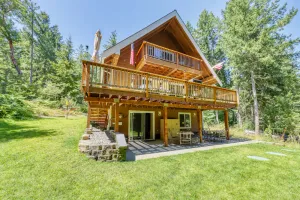 Image of Incredible home with a game room, full kitchen, gas grill, & wood stove