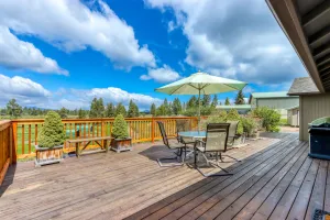 Image of Mountain-view retreat with deck, grill, wood stove, & washer\/dryer
