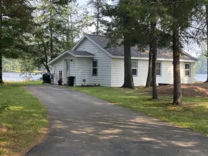 Image of WI River-Boom Lake cottage on spacious lot, water on 3 sides, kayaks, fire pit