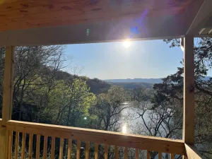 Image of Authentic Mountain Log Cabin Perched On A Cliff Side Above The Shenandoah River