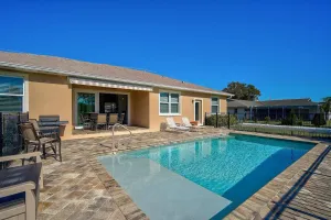 Image of Your Serene Escape: Pool, Elegant 3BR Home with Gourmet Kitchen, Minutes to Dining and Shopping!