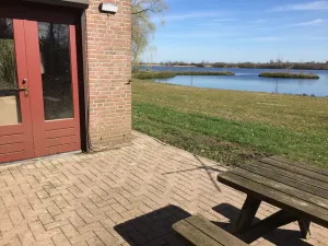 Image of House in a green area facing an almost private 65ha lake.