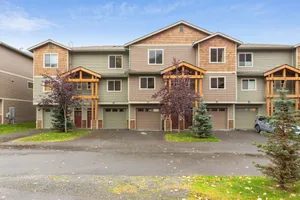 Image of Modern riverfront condo with hot tub, entertainment & river views